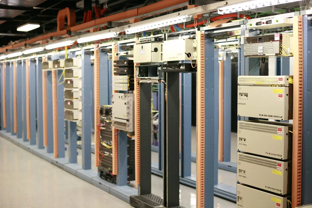Rows of server racks inside a data center