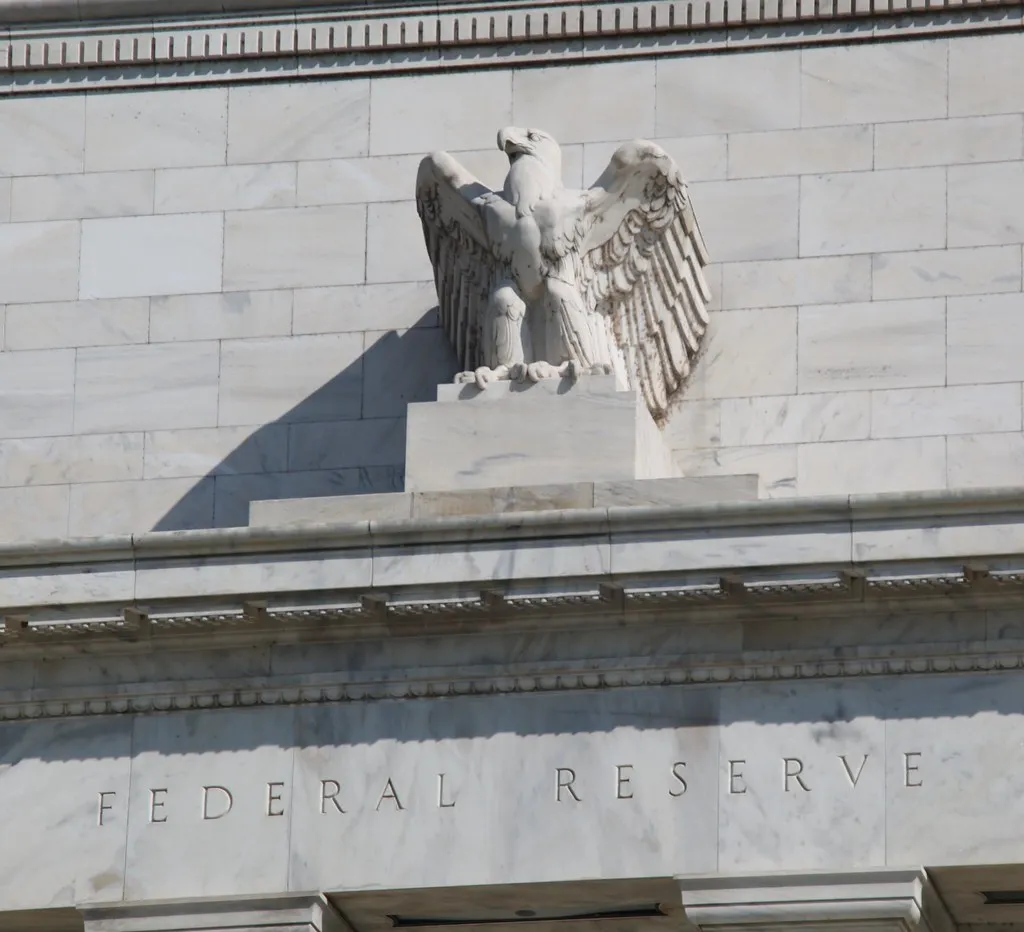 The Federal Reserve building facade with its carved marble eagle